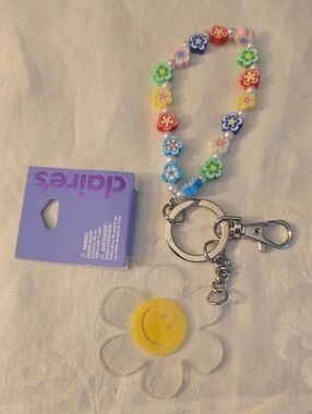 Claire's Multicolor Flower Bead Charm Keychain with Yellow Smile Accent